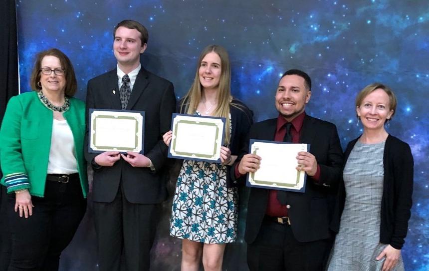 From left: 2019 Henderson Outstanding Tutor Award recipients Shawn DaRosa in science, Kaia Lindberg in math, and Nelson "Trey" Powers in writing.  They are congratulated by Coordinator of Science Center Tracey McDonnell Wysor (far left) and Coordinator of Writing Center Karen Bilotti (far right).